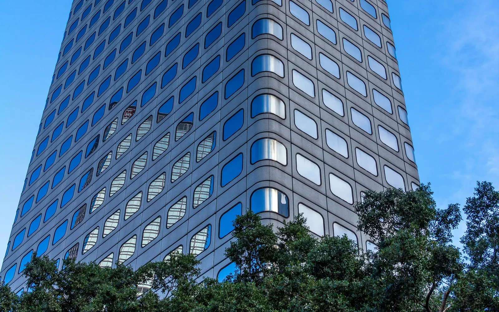 A commercial office tower seen from street level